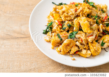 stir-fried egg with Thai basil and chilli 103823082