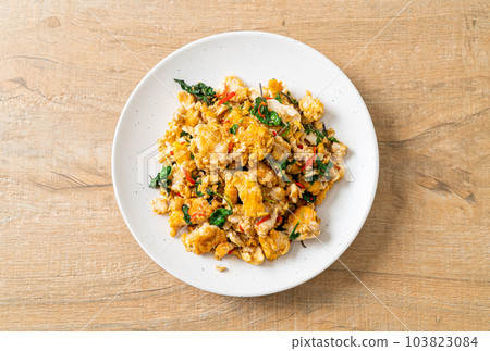 stir-fried egg with Thai basil and chilli stir-fried egg with Thai basil and chilli 103823084