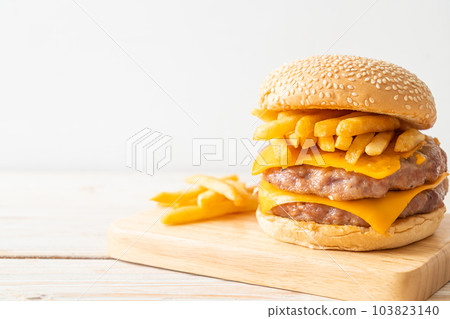 pork burger with cheese and french fries 103823140