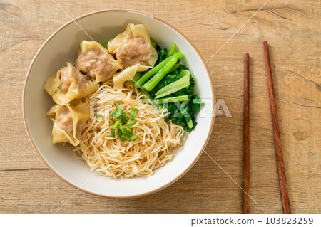 dried egg noodles with pork wonton or pork dumplings without soup dried egg noodles with pork wonton or pork dumplings without soup 103823259