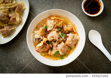 pork wonton soup or pork dumplings soup with roasted chili 103823262