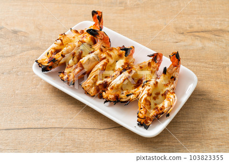 grilled river prawns or shrimps with cheese grilled river prawns or shrimps with cheese 103823355