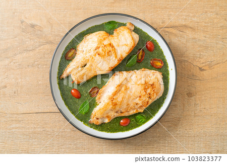 grilled chicken steak with pesto sauce grilled chicken steak with pesto sauce 103823377