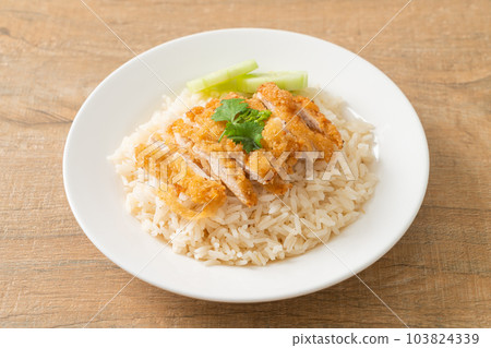 Steamed Rice with Fried Chicken or Hainanese Chicken Rice 103824339