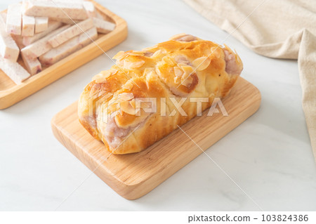 taro toast bread on wood board taro toast bread on wood board 103824386