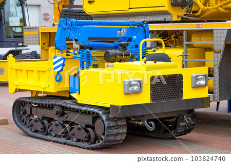 Mobile construction crane yellow blue color with telescopic loading platform. 103824740