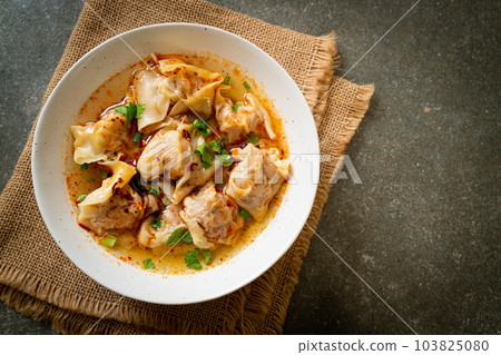 pork wonton soup or pork dumplings soup with roasted chili 103825080