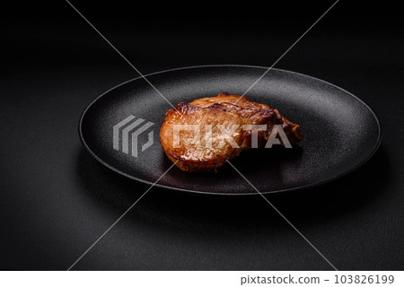 Delicious juicy pork or beef steak with salt, spices and herbs Delicious juicy pork or beef steak with salt, spices and herbs 103826199