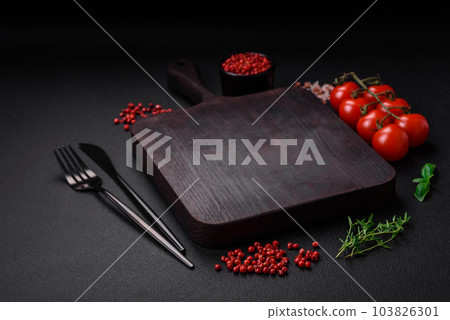 Ingredients for cooking cherry tomatoes, salt, spices and herbs 103826301