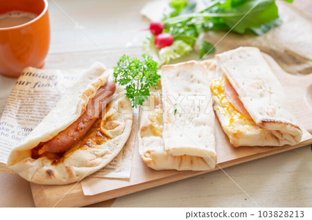 wrap sandwich and coffee 103828213