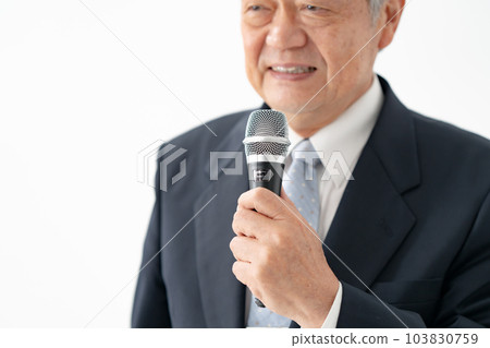 A man who speaks with a microphone Senior A man who speaks with a microphone Senior 103830759