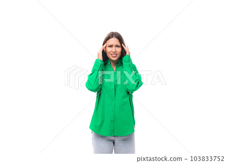 attractive confused young caucasian brunette lady with make-up dressed in an elegant green shirt on attractive confused young caucasian brunette lady with make-up dressed in an elegant green shirt on 103833752