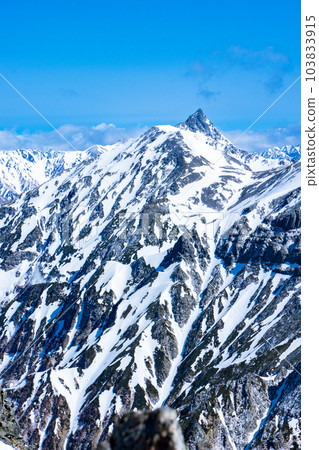 View from the summit of Mt. Karasawa in the Northern Alps: Mt. Yarigatake and Nishikama Ridge 103833915