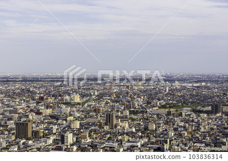 View of Gifu City, Ginan Town, and Ichinomiya City seen from Mt. Kinka in the evening 103836314