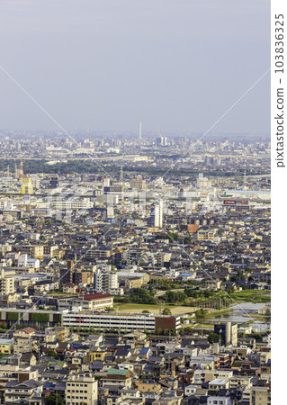 View of Gifu City, Ginan Town, and Ichinomiya City seen from Mt. Kinka in the evening View of Gifu City, Ginan Town, and Ichinomiya City seen from Mt. Kinka in the evening 103836325