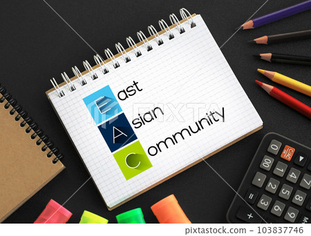 EAC - East Asian Community acronym on notepad, business concept background 103837746