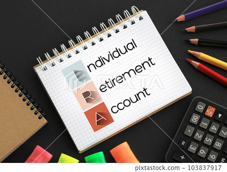 IRA - Individual Retirement Account acronym on notepad, concept background IRA - Individual Retirement Account acronym on notepad, concept background 103837917