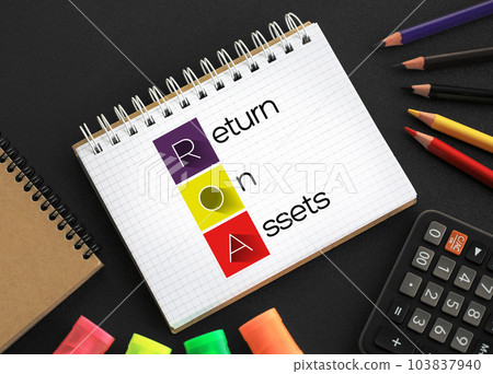 ROA - Return On Assets acronym on notepad, business concept background ROA - Return On Assets acronym on notepad, business concept background 103837940