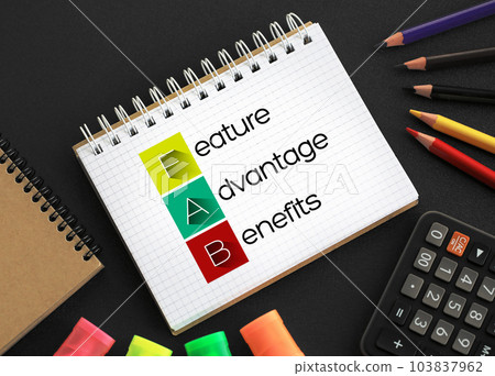 FAB - Feature Advantage Benefits acronym on notepad, business concept background 103837962