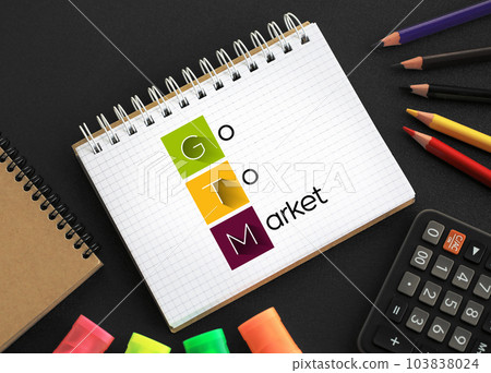 GTM - Go To Market acronym on notepad, business concept background 103838024