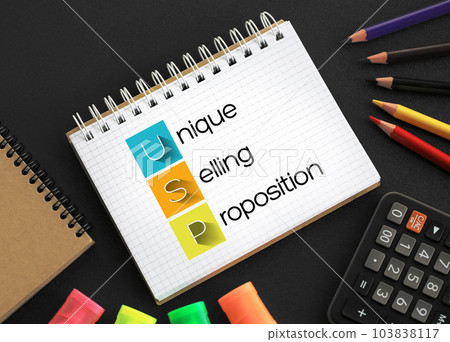 USP Unique Selling Proposition - essence of what makes your product or service better than competitors, acronym text on notepad USP Unique Selling Proposition - essence of what makes your product or service better than competitors, acronym text on notepad 103838117