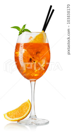 cold aperol spritz cocktail in glass with straw and slice of orange 103838170