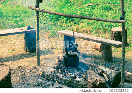 Tourist pot over camp fire 103838232