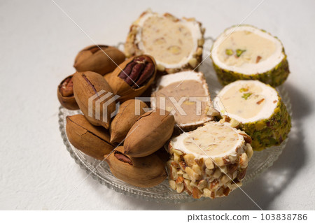 Delicious Turkish delight with pistachios and pecan Delicious Turkish delight with pistachios and pecan 103838786
