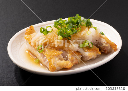 Deep-fried chicken with grated radish and ponzu sauce Deep-fried chicken with grated radish and ponzu sauce 103838818