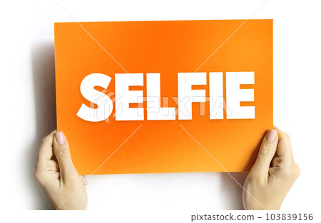 Selfie is a self-portrait photograph, typically taken with a digital camera or smartphone, text concept on card Selfie is a self-portrait photograph, typically taken with a digital camera or smartphone, text concept on card 103839156