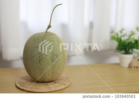 Fruits for healthcare Green Melon wooden table honey melon or cantaloupe 103840501
