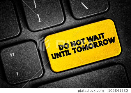 Do Not Wait Until Tomorrow text button on keyboard, concept background 103841580