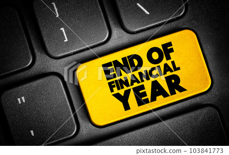 End Of Financial Year text button on keyboard, concept background End Of Financial Year text button on keyboard, concept background 103841773