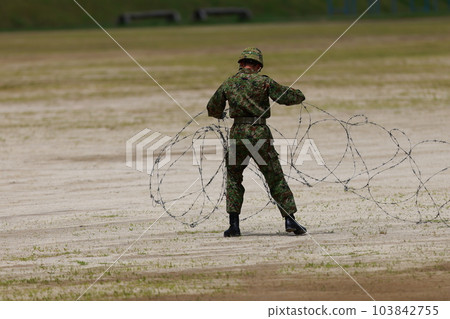 Self-Defense Forces personnel putting up barbed wire Self-Defense Forces personnel putting up barbed wire 103842755