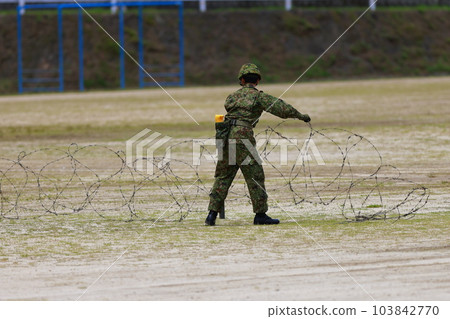 Self-Defense Forces personnel putting up barbed wire Self-Defense Forces personnel putting up barbed wire 103842770