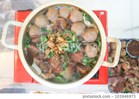 meat soup or beef soup or noodles 103846973