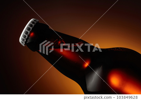 Close-up of an unopened beer bottle. 103849628