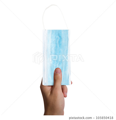Isolated hand that hold a mask against covid-19 Isolated hand that hold a mask against covid-19 103850418