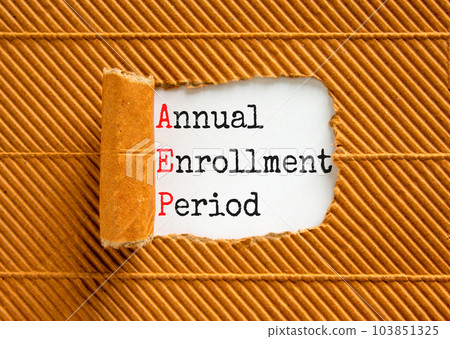 AEP symbol. Concept words AEP Annual enrollment period on beautiful white paper. Beautiful white table brown background. Medical and AEP Annual enrollment period concept. Copy space. AEP symbol. Concept words AEP Annual enrollment period on beautiful white paper. Beautiful white table brown background. Medical and AEP Annual enrollment period concept. Copy space. 103851325