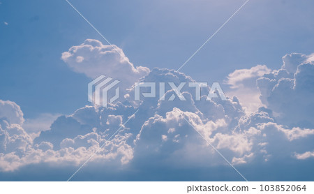 Beautiful white fluffy clouds sky background abstract season and weather. Beautiful white fluffy clouds sky background abstract season and weather. 103852064