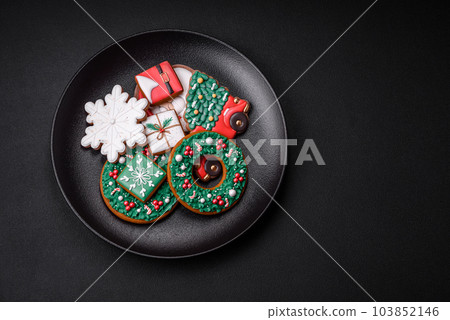 Delicious fresh colorful Christmas or New Year gingerbread cookies 103852146