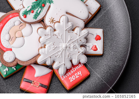 Delicious fresh colorful Christmas or New Year gingerbread cookies 103852165