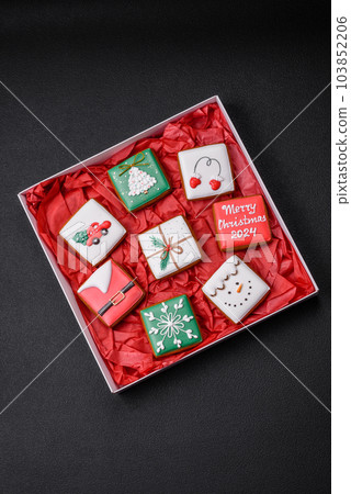 Delicious fresh colorful Christmas or New Year gingerbread cookies 103852206