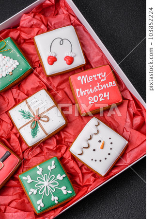 Delicious fresh colorful Christmas or New Year gingerbread cookies 103852224