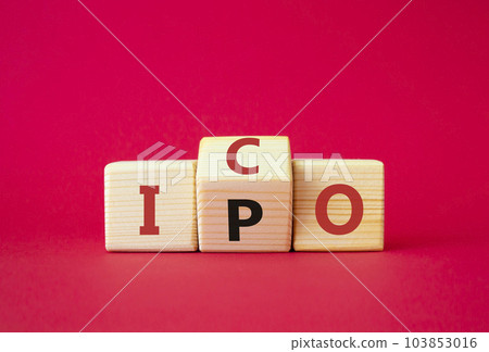 ICO and IPO symbol. Wooden cubes with words ICO - initial coin offering and IPO - initial public offering. Beautiful red background. Business concept. Copy space ICO and IPO symbol. Wooden cubes with words ICO - initial coin offering and IPO - initial public offering. Beautiful red background. Business concept. Copy space 103853016