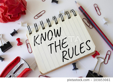 Know the rules symbol. Concept words Know the rules on white notebook. Beautiful white background. Business and Know the rules concept. Copy space. Know the rules symbol. Concept words Know the rules on white notebook. Beautiful white background. Business and Know the rules concept. Copy space. 103853081