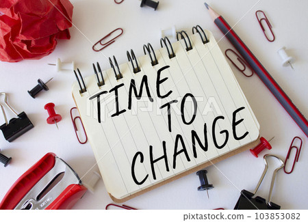 Time to change symbol. Concept words Time to change on wooden notebook. Beautiful white background. Business and Time to change concept. Copy space. 103853082