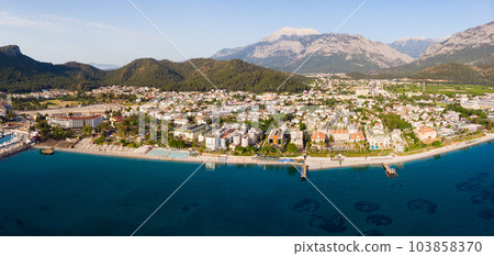 Drone view of Turkish seaside resort city of Kemer on Mediterranean coast Drone view of Turkish seaside resort city of Kemer on Mediterranean coast 103858370