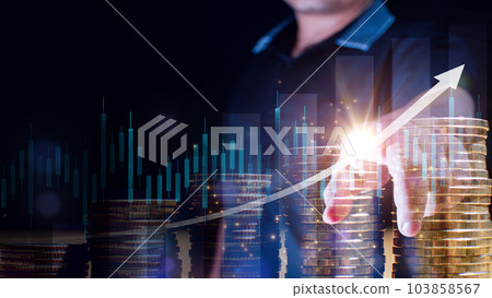 Double exposure of Businessman touches stack of money coin with a trading graph for finance investors. Cryptocurrency digital economy. Financial investment background concept. Double exposure of Businessman touches stack of money coin with a trading graph for finance investors. Cryptocurrency digital economy. Financial investment background concept. 103858567