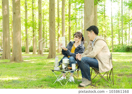 Photo of men and women camping 103861168